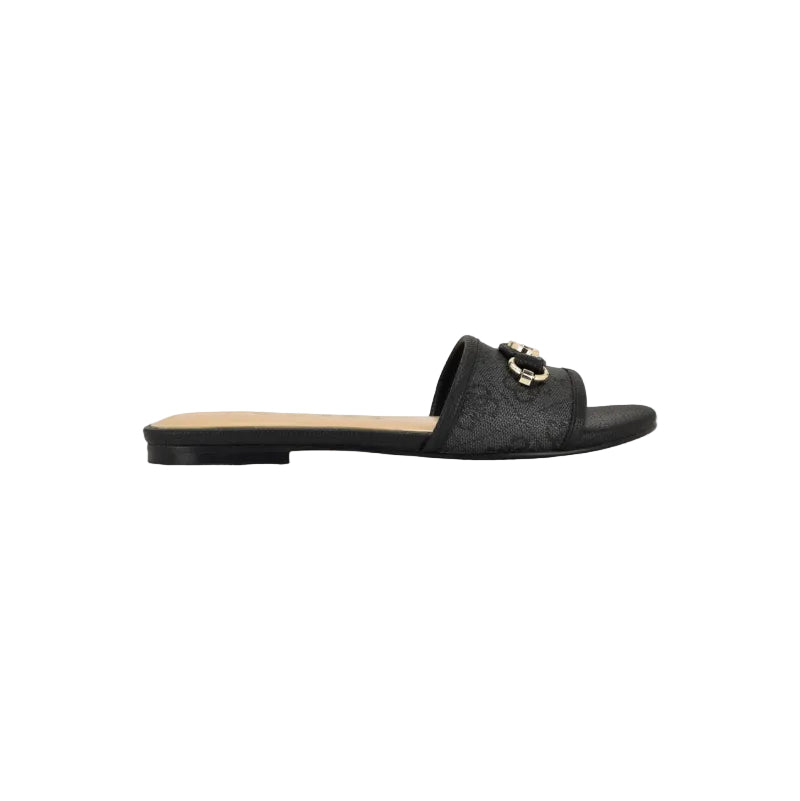 A single black flat slide sandal with a textured strap featuring an embossed monogram pattern and a gold-tone horsebit detail, shown in profile against a white background.