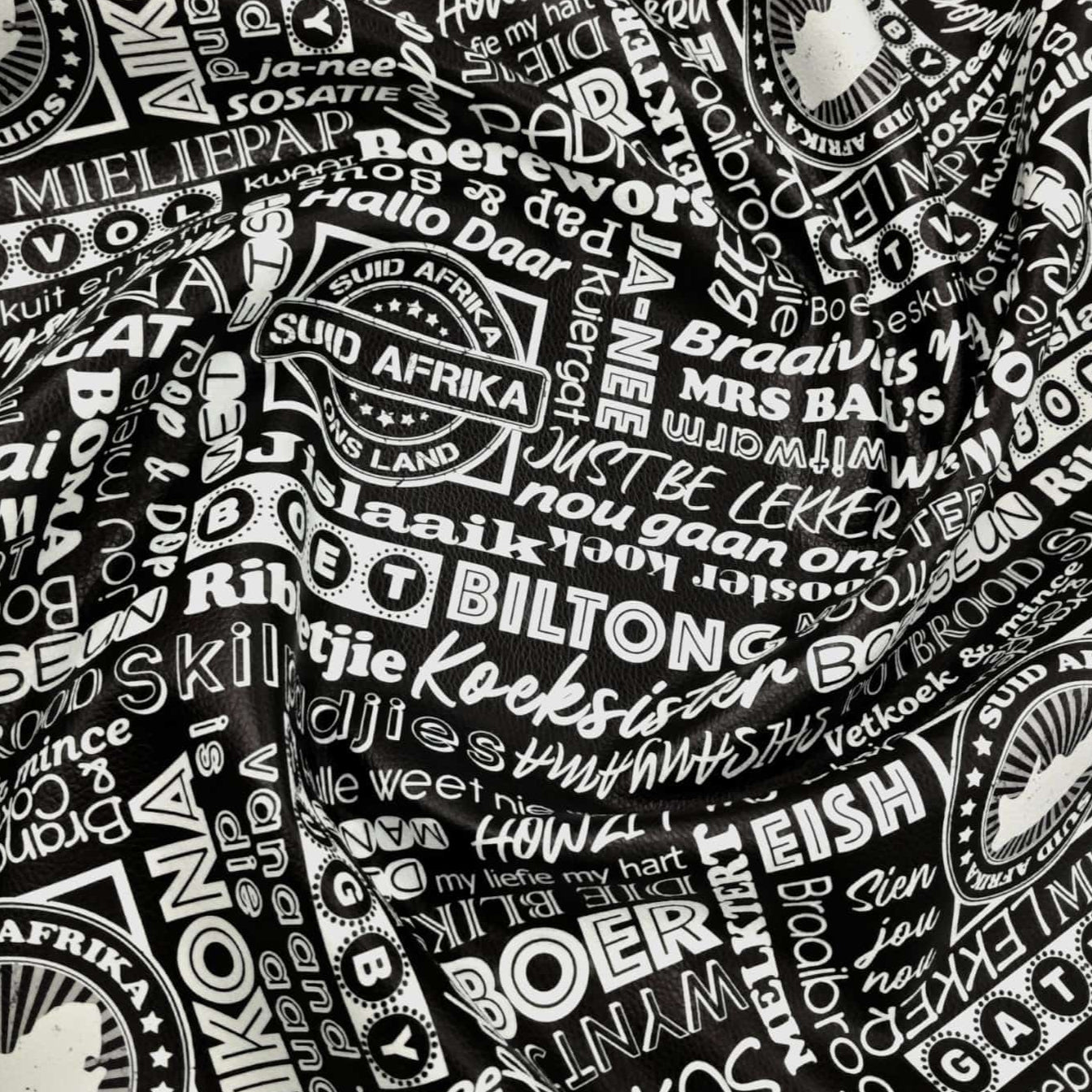 LOOM CRAFT Upholstery Fabric Black Upholstery Printed Vinyl Afrikaans Braai Collection 145 cm