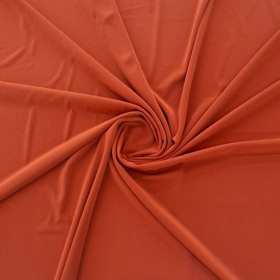 MHC Dress Fabrics Rust P/D Bon Bon Spandex